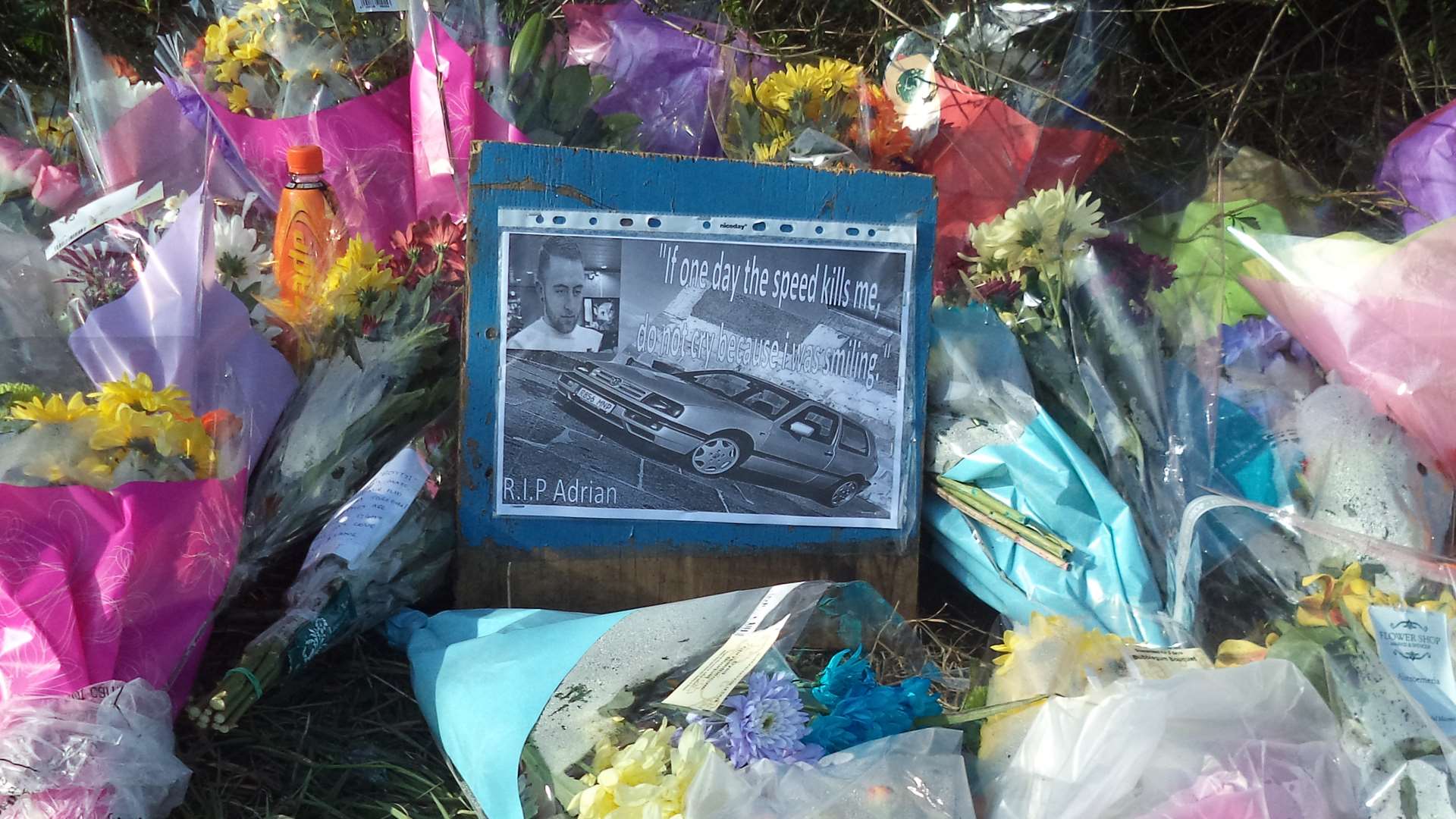 Flowers left at the scene of the crash