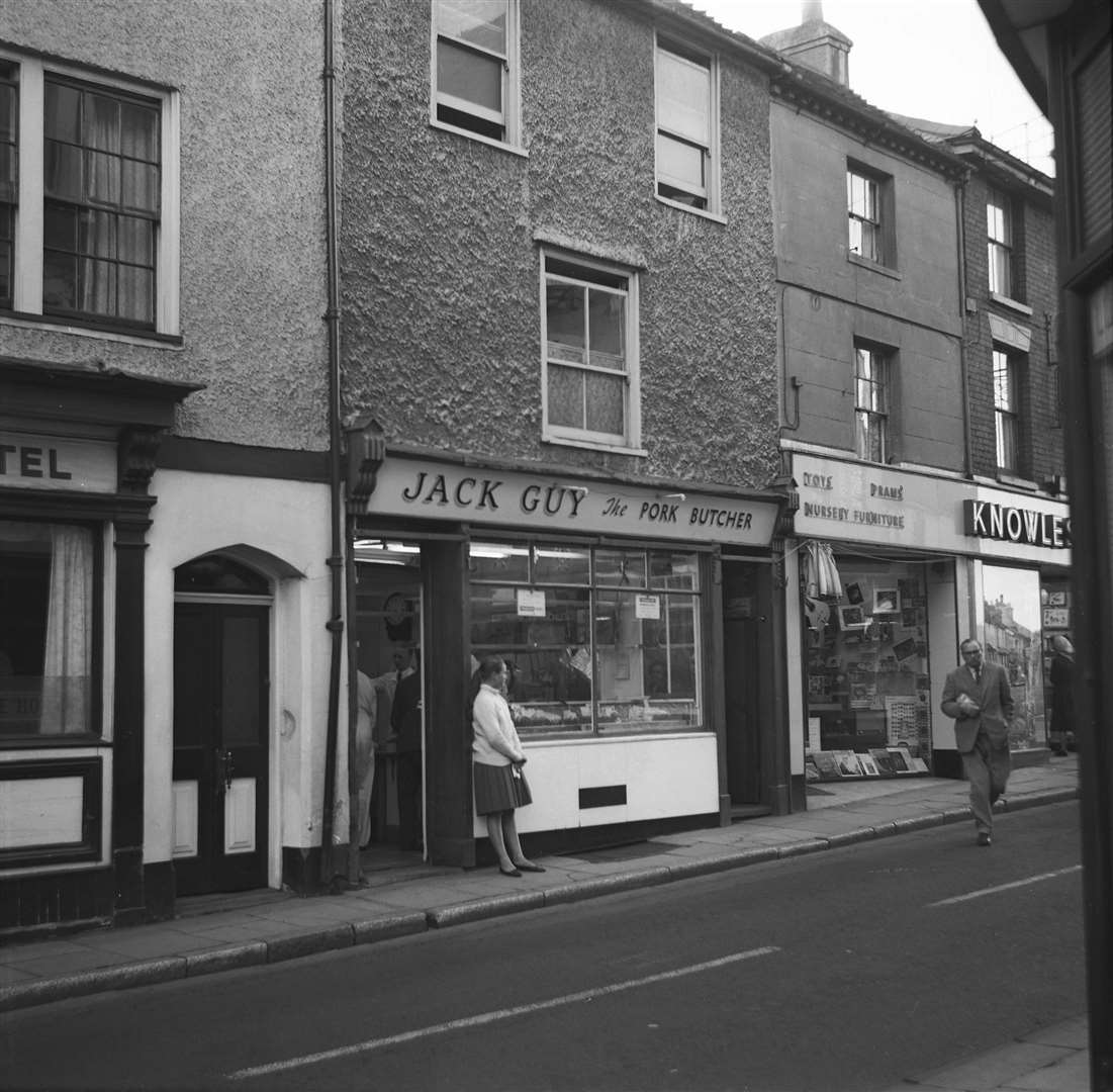 Jack Guy the Pork Butcher, pictured in 1964, operated from premises in Castle Street, Ashford, next to the Castle Hotel. The building is now occupied by independent jeweller Topps