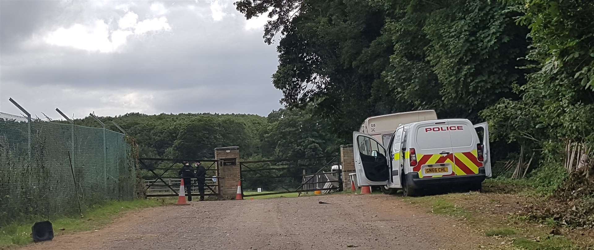 Police officers were searching a field in Meadow Crest Farm today