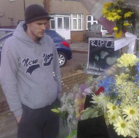 REFLECTIVE MOMENT: Jamie Waite at the site of tributes to his brother
