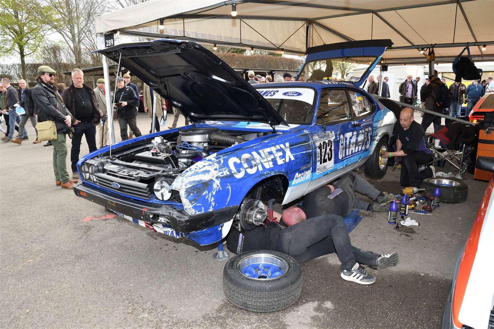 Ric Wood's team repair Jake Hill's car, after crashing during qualifying. Picture: Simon Hildrew