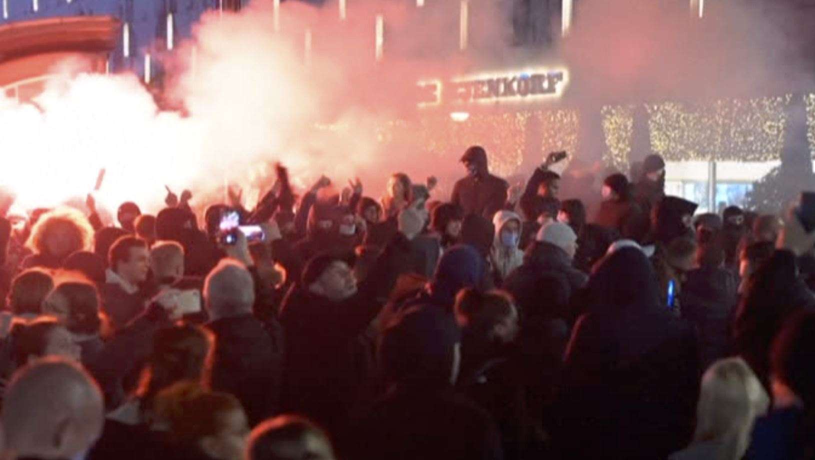 Police fired warning shots as riots broke out on Friday night in downtown Rotterdam (Media TV Rotterdam via AP)