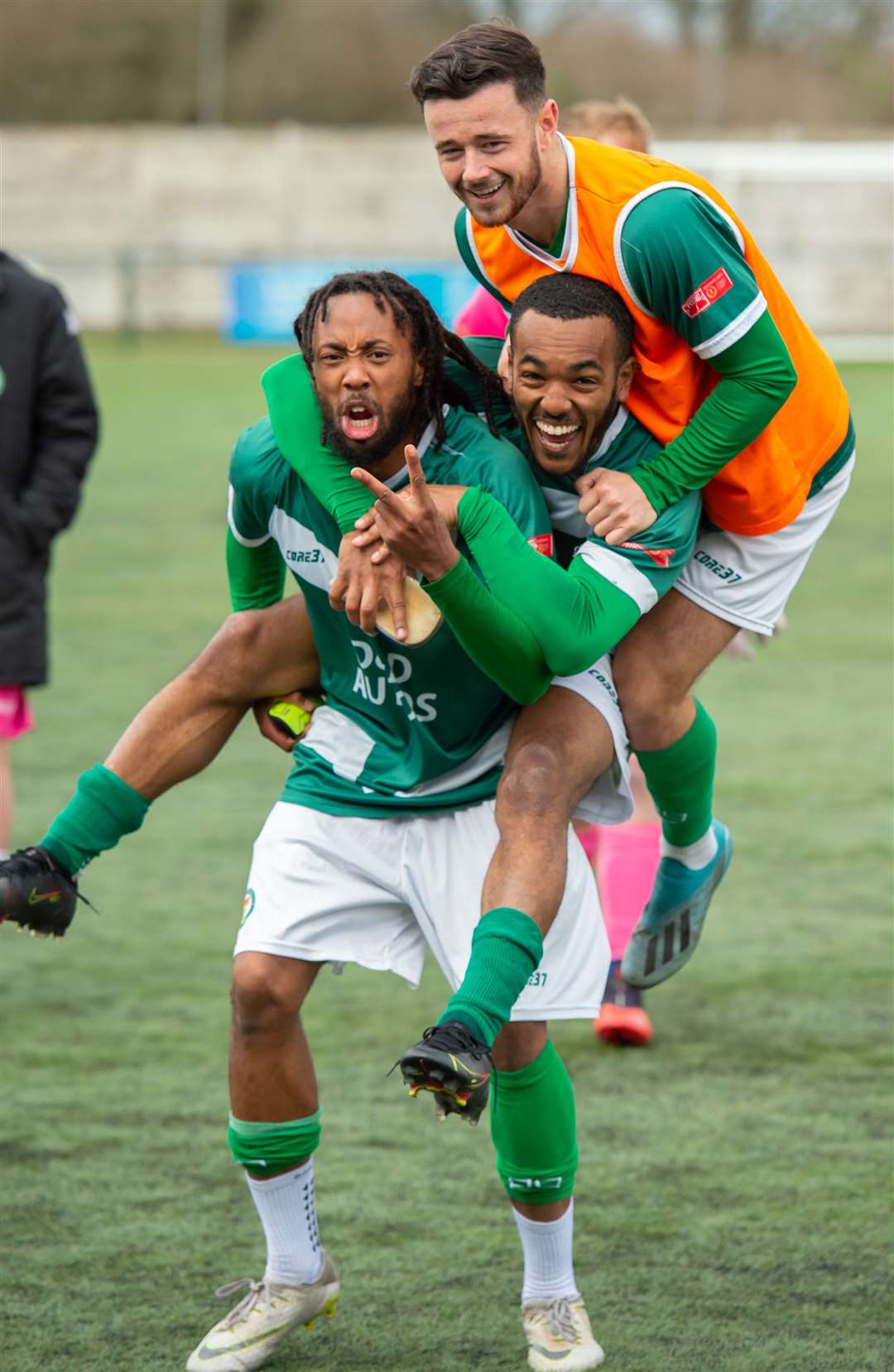 Bradley Simms, Tariq Ossai and Danny Parish celebrate Ashford's victory over Lancing. Picture: Ian Scammell