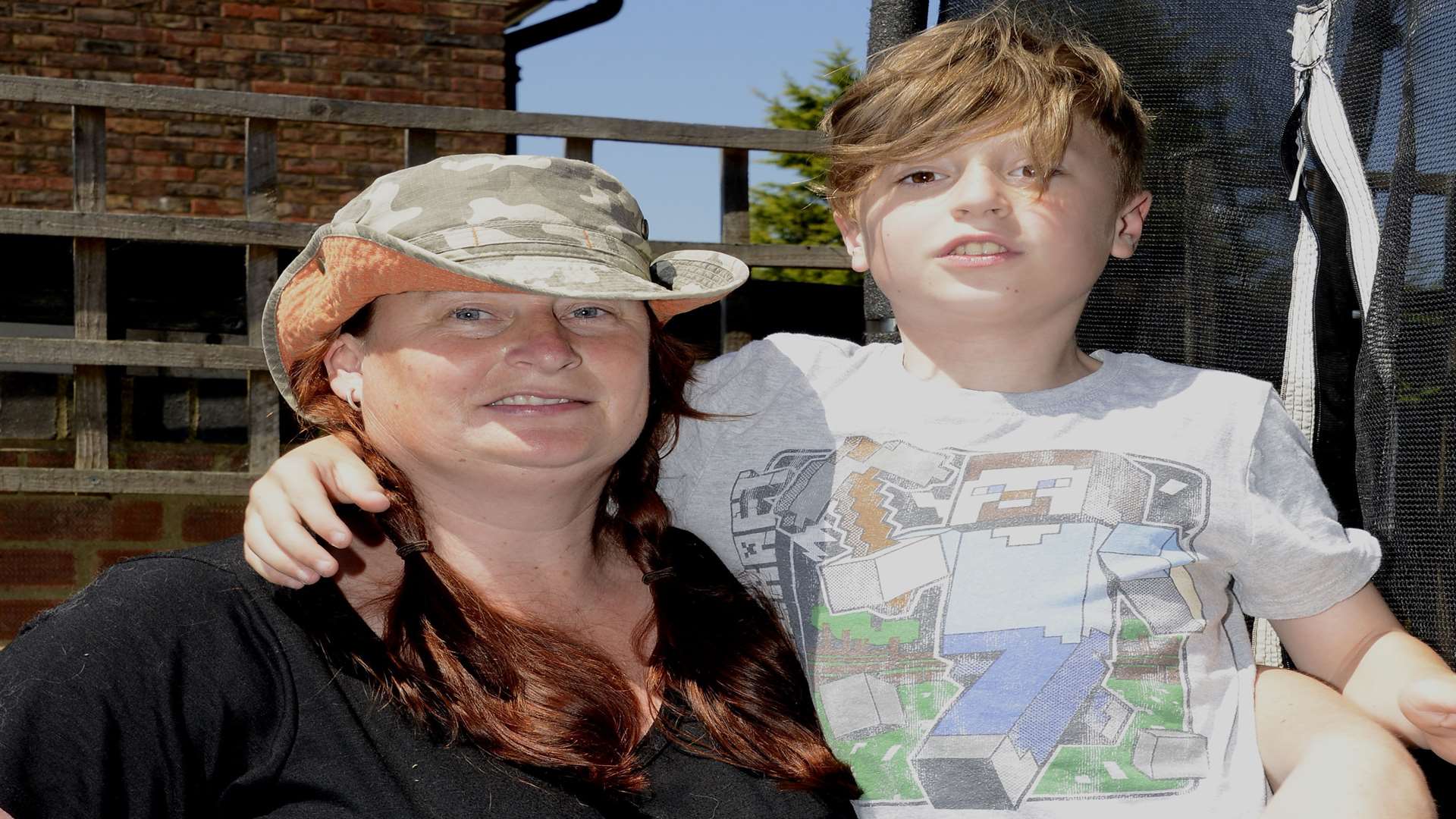 Susan Haddy and son Aidan who has been suspended from school