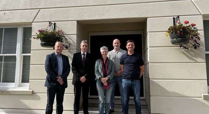 Adrian Hammond, Steve Grimshaw, Cllr Rebecca Shoob, Ryan Green and Tommy Ould outside the new flats in The Bayle, Folkestone. Photo: Kent County Council