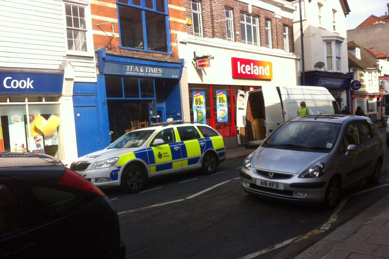 Police parked outside Tea and Times
