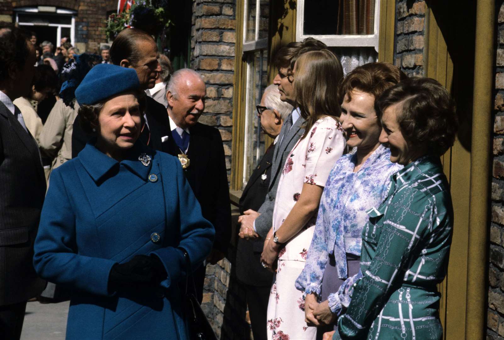 The Queen visits the recently rebuilt set of ITV’s Coronation Street in May 1982 and meets some of the cast; from left to right: Jack Howarth, William Roache, Anne Kirkbride, Eileen Derbyshire and Thelma Barlow (PA)
