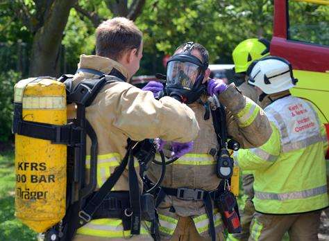 Firefighters used breathing gear to tackle the blaze. Stock image