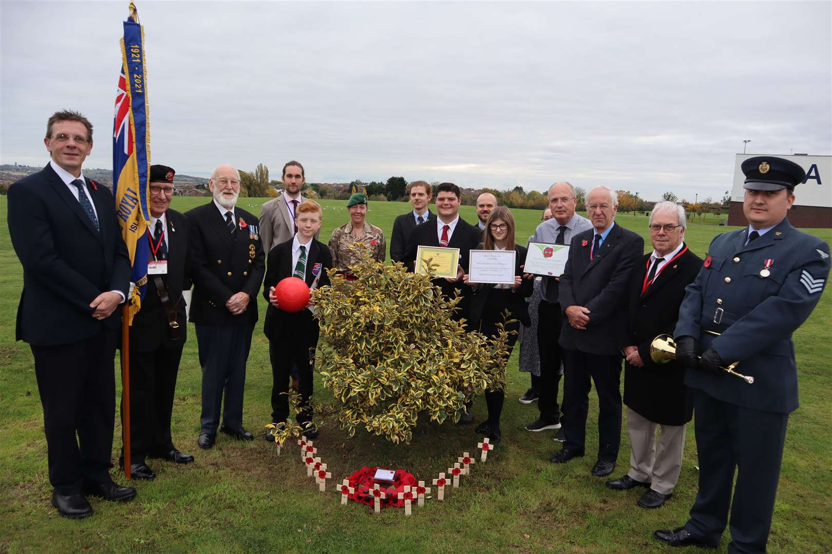 Wreath-laying ceremony at the Oasis Academy Isle of Sheppey peace tree on the Minster campus