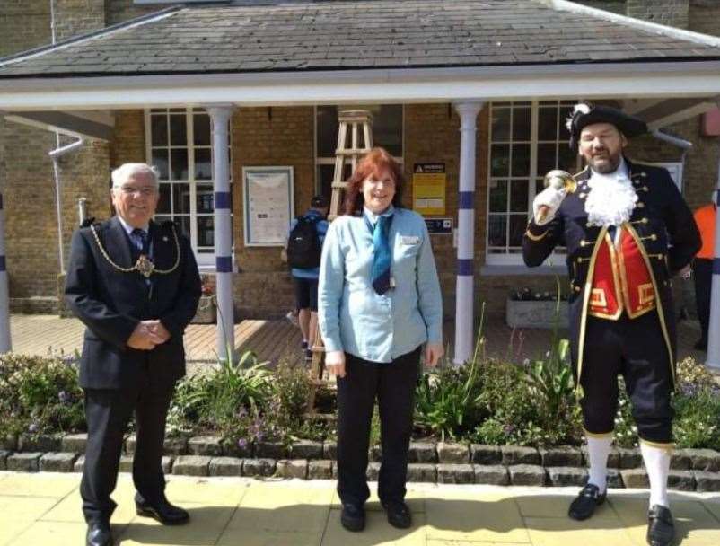 Town Sargeant Kevin Cook is town crier welcoming visitors to The 149th Open in Sandwich. Pictured with Southeastern employee Lucy Dent. But how many of them really saw the town?
