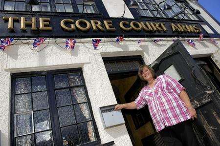 Delph Whitcombe, landlady of the Gore Court Arms, Gore Court Road, Sittingbourne, photographed on the 5th anniversary of the smoking ban for enclosed public places