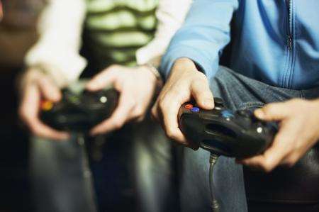 Video game players.Picture: Jupiterimages, Brand X Pictures