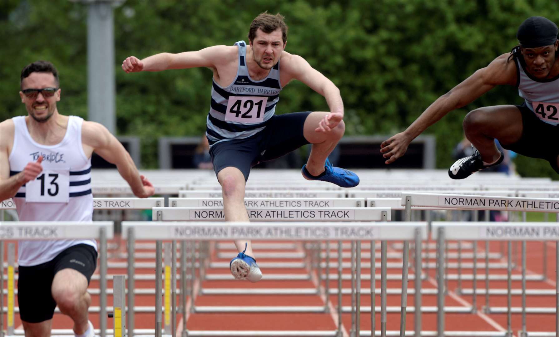 From left, Benjamin Richardson (winner), Lewis Heffernan (second) and Brandon Sikity (third) in the senior men’s 110m hurdle final. Picture: Barry Goodwin