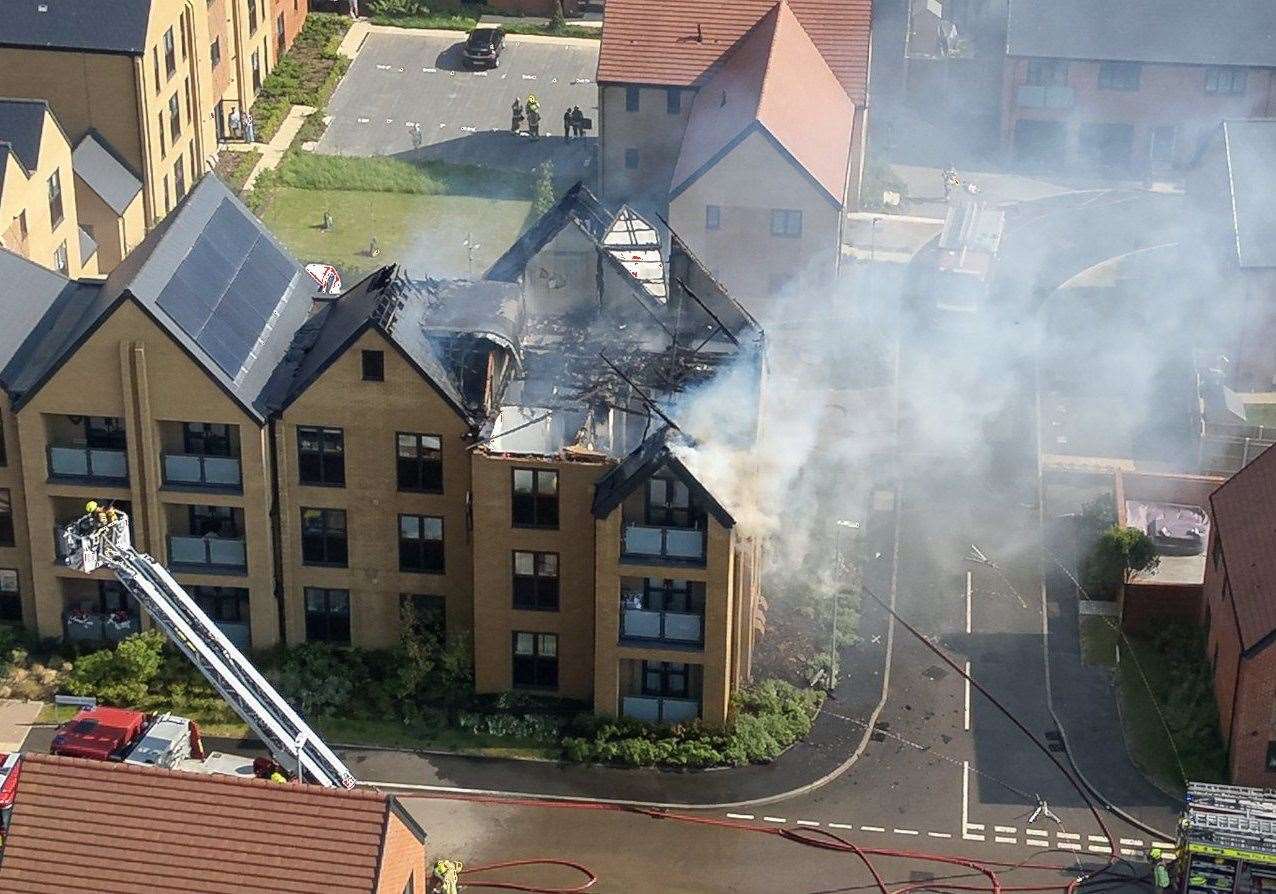 Damage caused by a roof fire at flats in Eden Road, in Langley, Maidstone. Picture: UKNIP