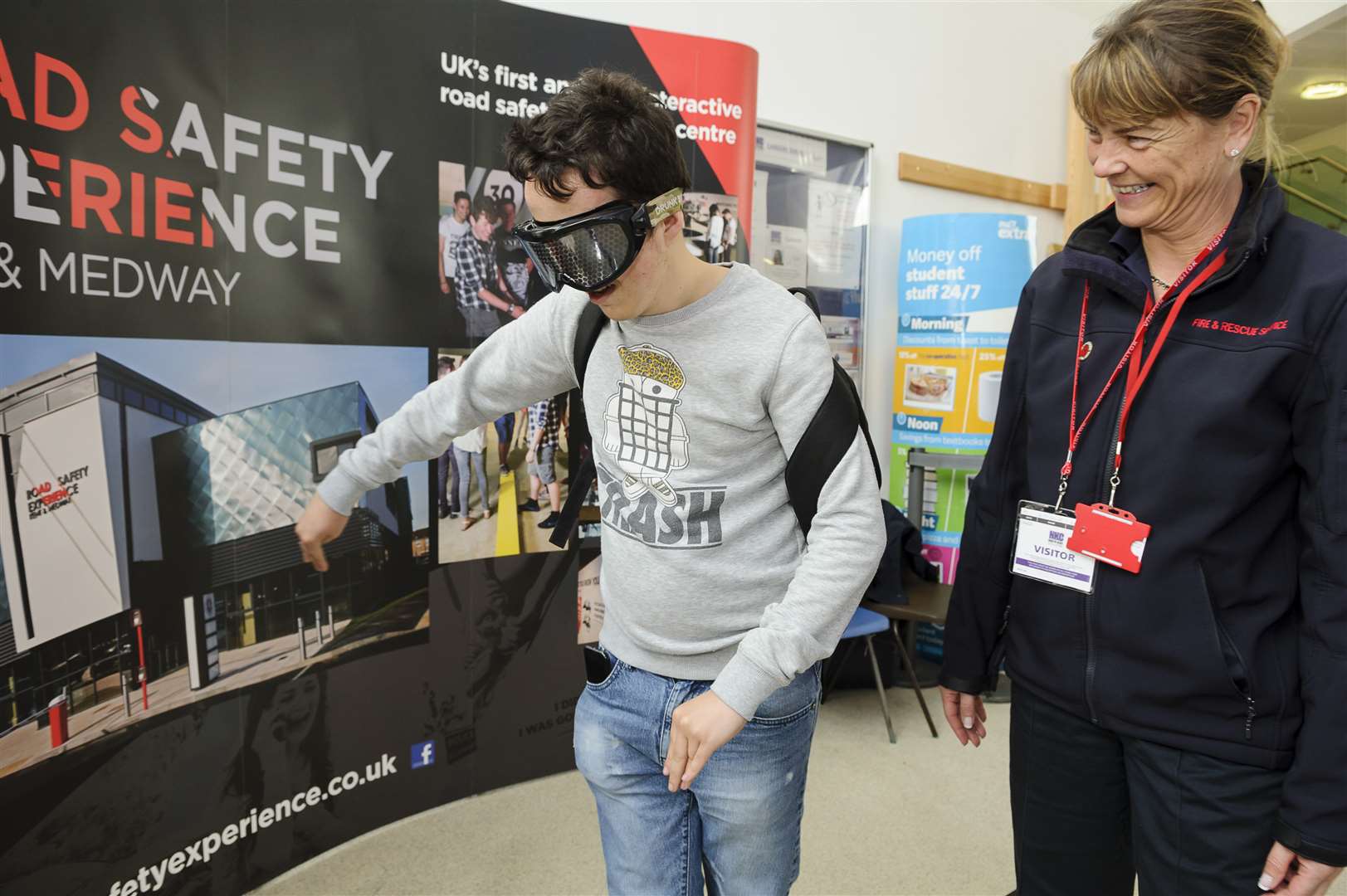 Harvey Boulding finds out how difficult walking the line is with the drugs goggles on, watched by Kerrie Moncrieff, Road Safety Officer for KFRS