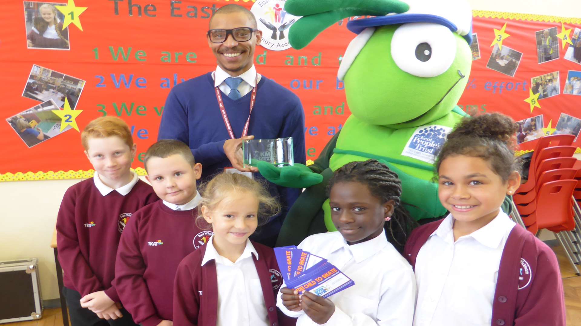 Eric Hodges of Orbit South and Buster Bug join pupils from East Wickham Primary Academy to launch Walk to School Month.