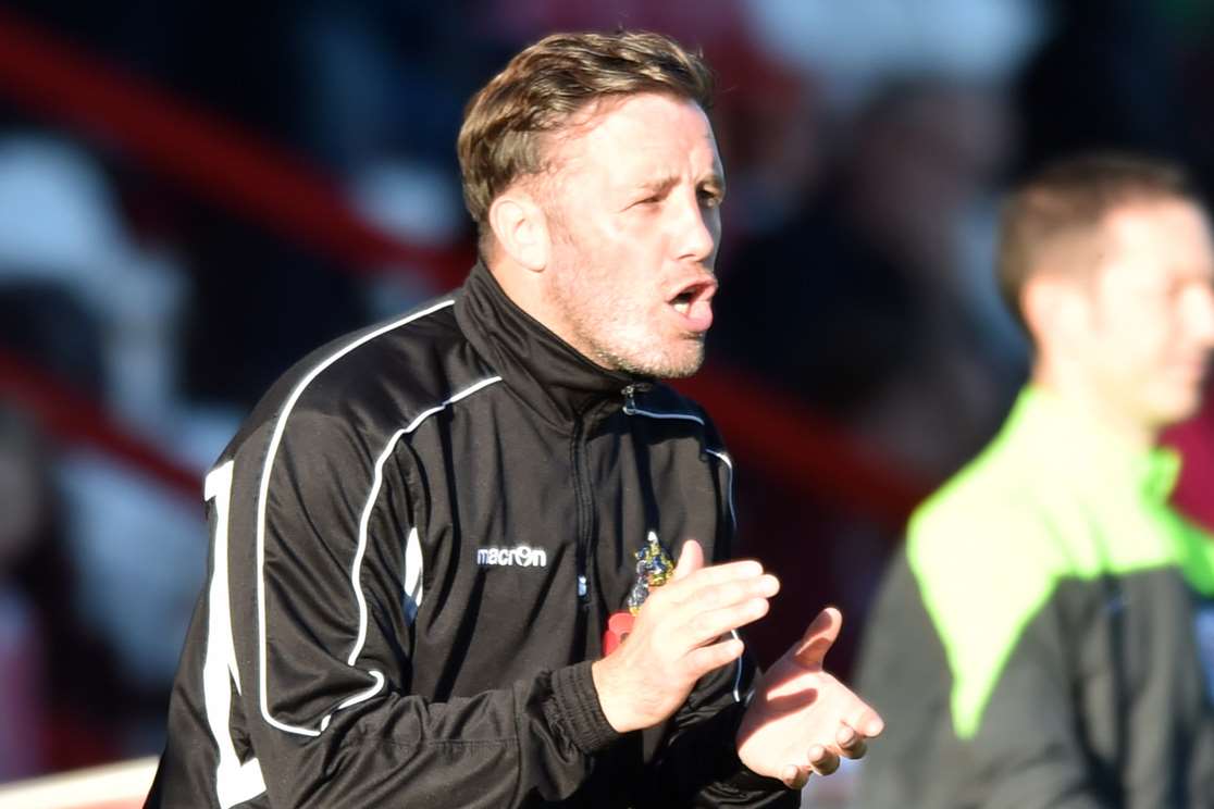 Maidstone boss Jay Saunders encourages his players at Stevenage Picture: Keith Gillard