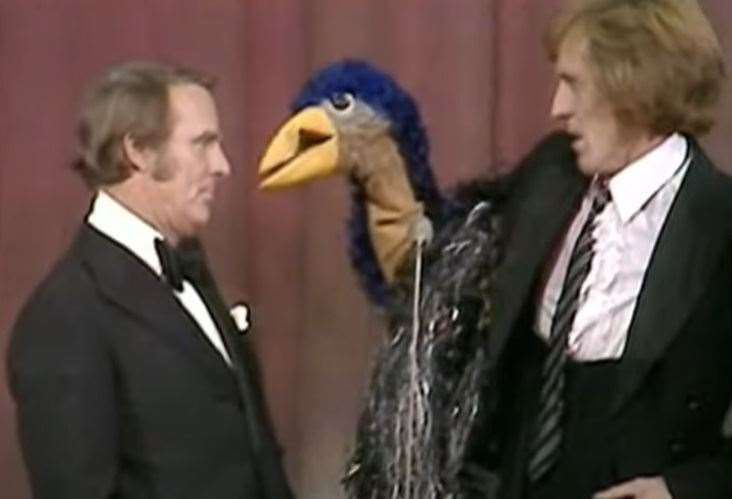 Rod Hull and Emu create a stir with Dickie Henderson at the London Palladium for the 1972 Royal Variety Performance. Picture: Rod Hull: A Bird in the Hand/Channel 4