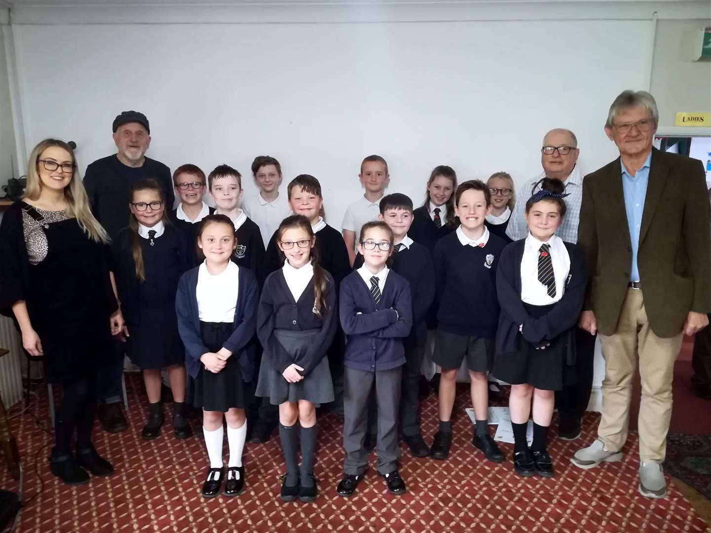 Warden House School Choir performing at the Deal at the Betteshanger Welfare Sports and Social Club where we launched the book.The adults in the picture are (from left to right) Kelly Allsopp choir trainer, Martin Riley author, Jim Davies BEM Miners Heritage and David Burridge composer.