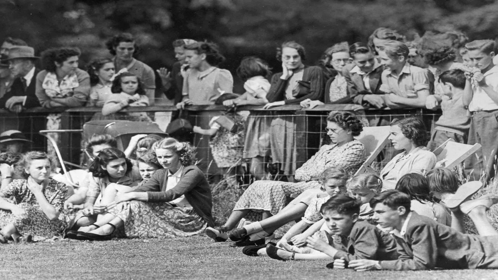The Queen and Lady Brabourne relax in deck chairs watching cricket at Mersham-le-Hatch. Picture: "Images of Ashford" book by Mike Bennett