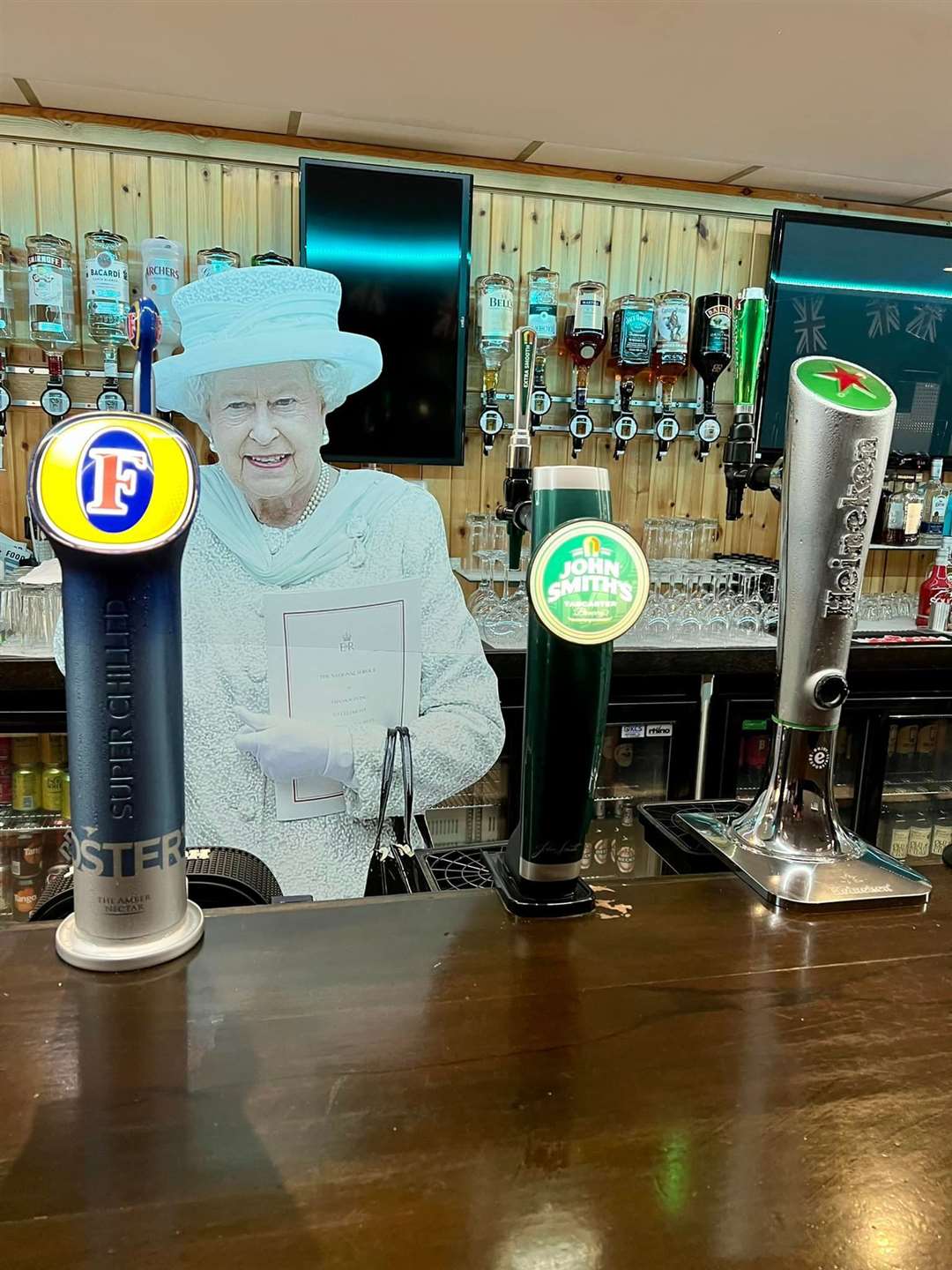 The Queen appears to have made an early appearance behind the bar at Priory Hill Holiday Park in Wing Road, Leysdown, in readiness for her Platinum Jubilee