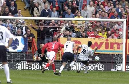 Bolton captain Jay Jay Okocha sends Dean Kiely the wrong way from the penalty spot. Picture: MATT WALKER