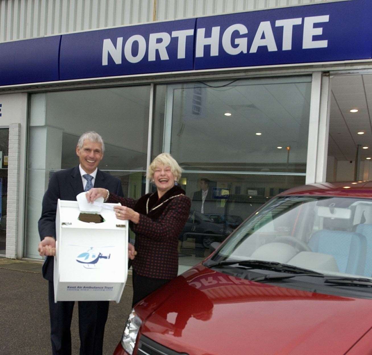 Lady Mayoress Jenny Vye makes a charity raffle draw for a new car assisted by Peter Hinkins, MD of Northgate Garage Group, in 2005