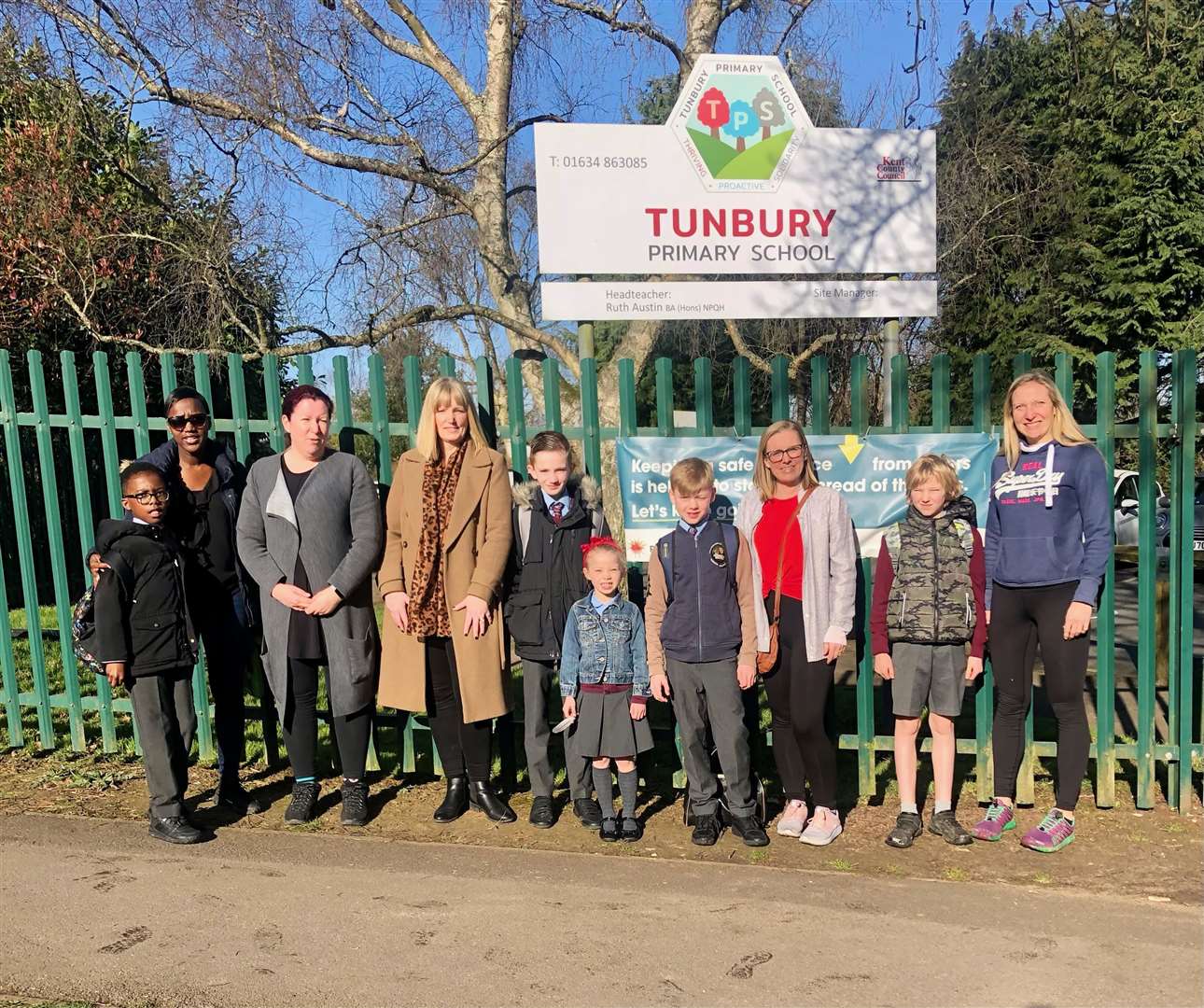 Parents and children outside Tunbury Primary School in Walderslade where there is a campaign for better road safety measures