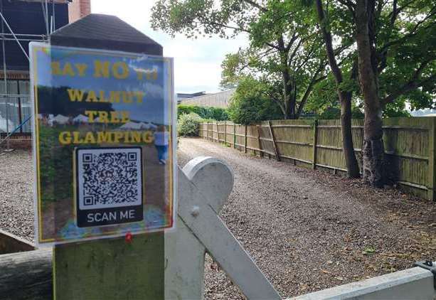 Posters urging people to object to the glamping site plans have been put up around the village