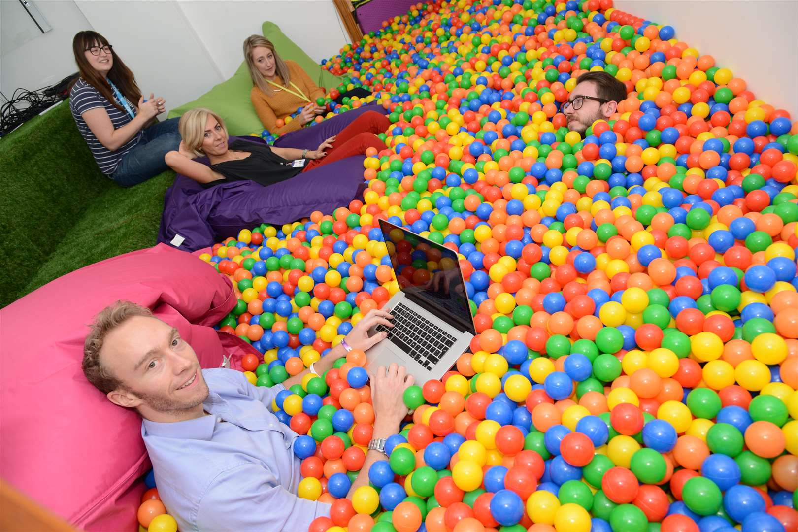 Sleeping Giant Media boss Luke Quilter begins a meeting in the ball pool