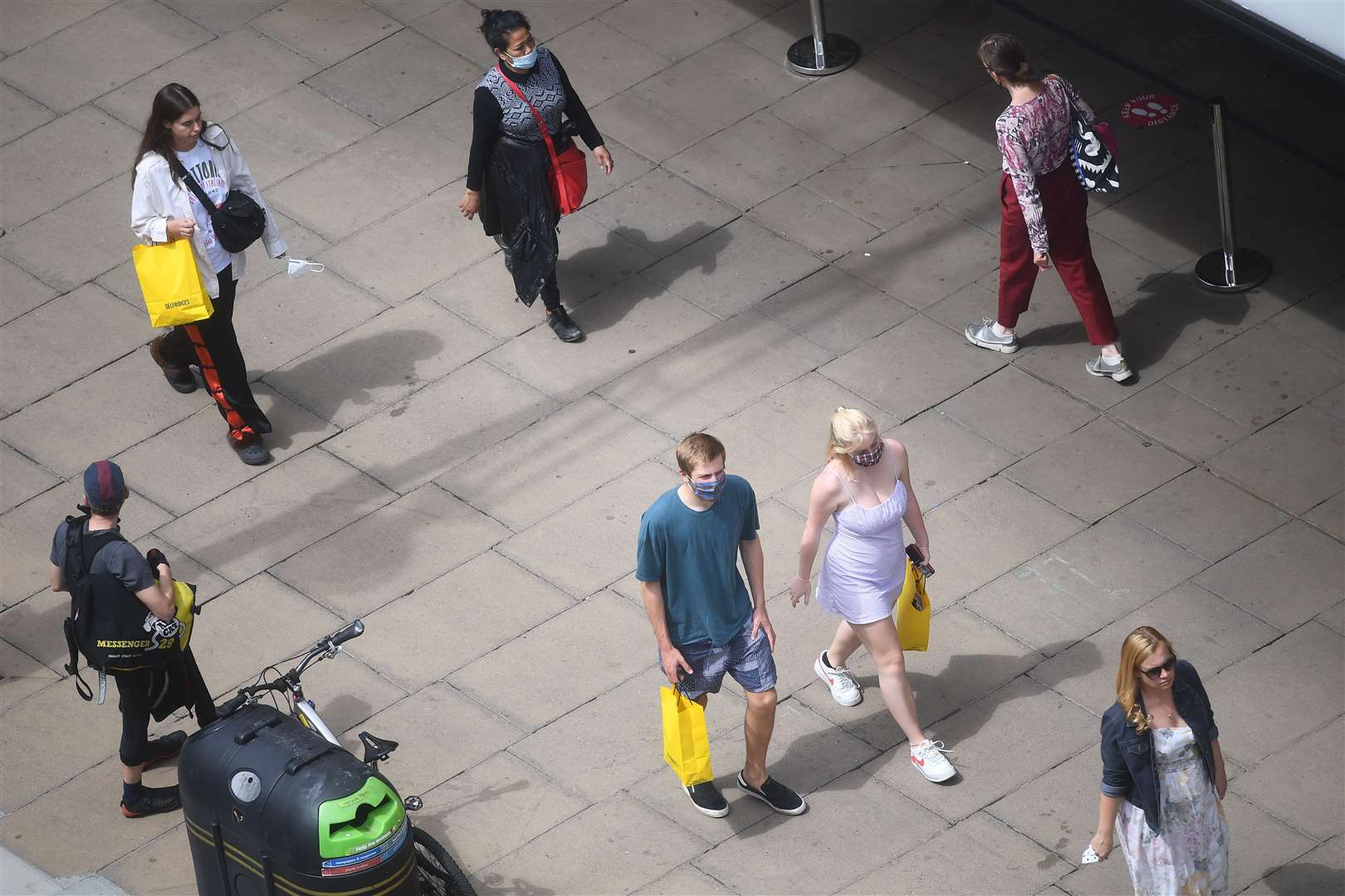 People wearing face coverings on Oxford Street, London (Victoria Jones/PA)