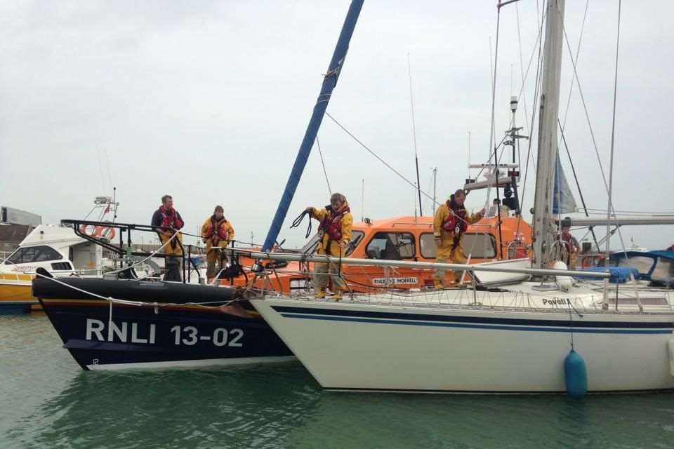 The Dungeness lifeboat with the yacht it rescued moored at Dover. Picture: James Clapham