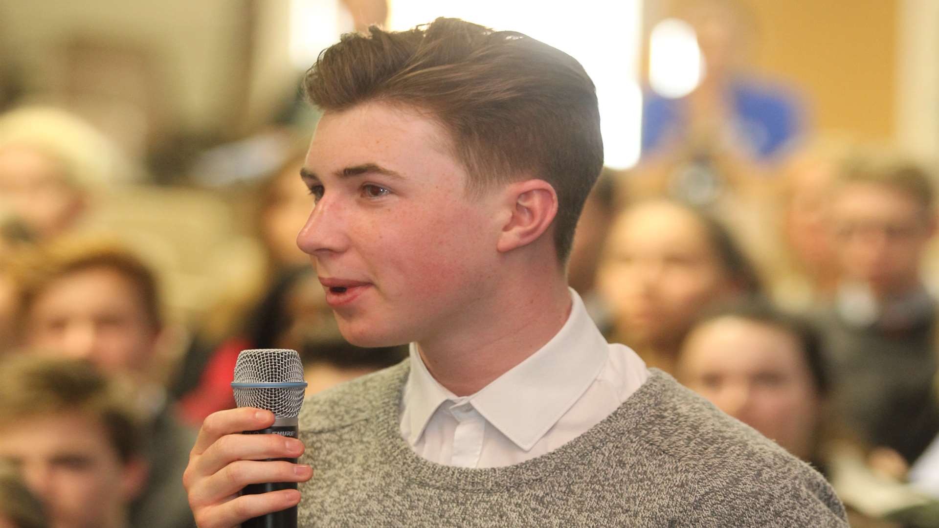 Callum Smith, 16 asks a question of a political made up panel at a Question Time styled forum held at Walderslade Girls's School