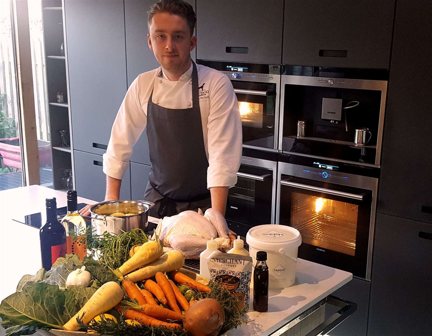 Chef Sam McClurkin with the ingredients for his Christmas dinner