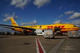DHL's Boeing 767 on the runway, ready to deliver the gorillas to the wild