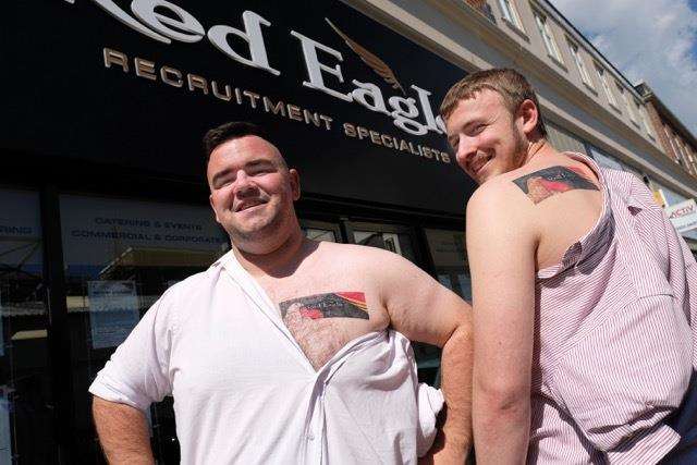 Andrew Martyn and Lewis Farnham showing off their Red Eagle tattoos