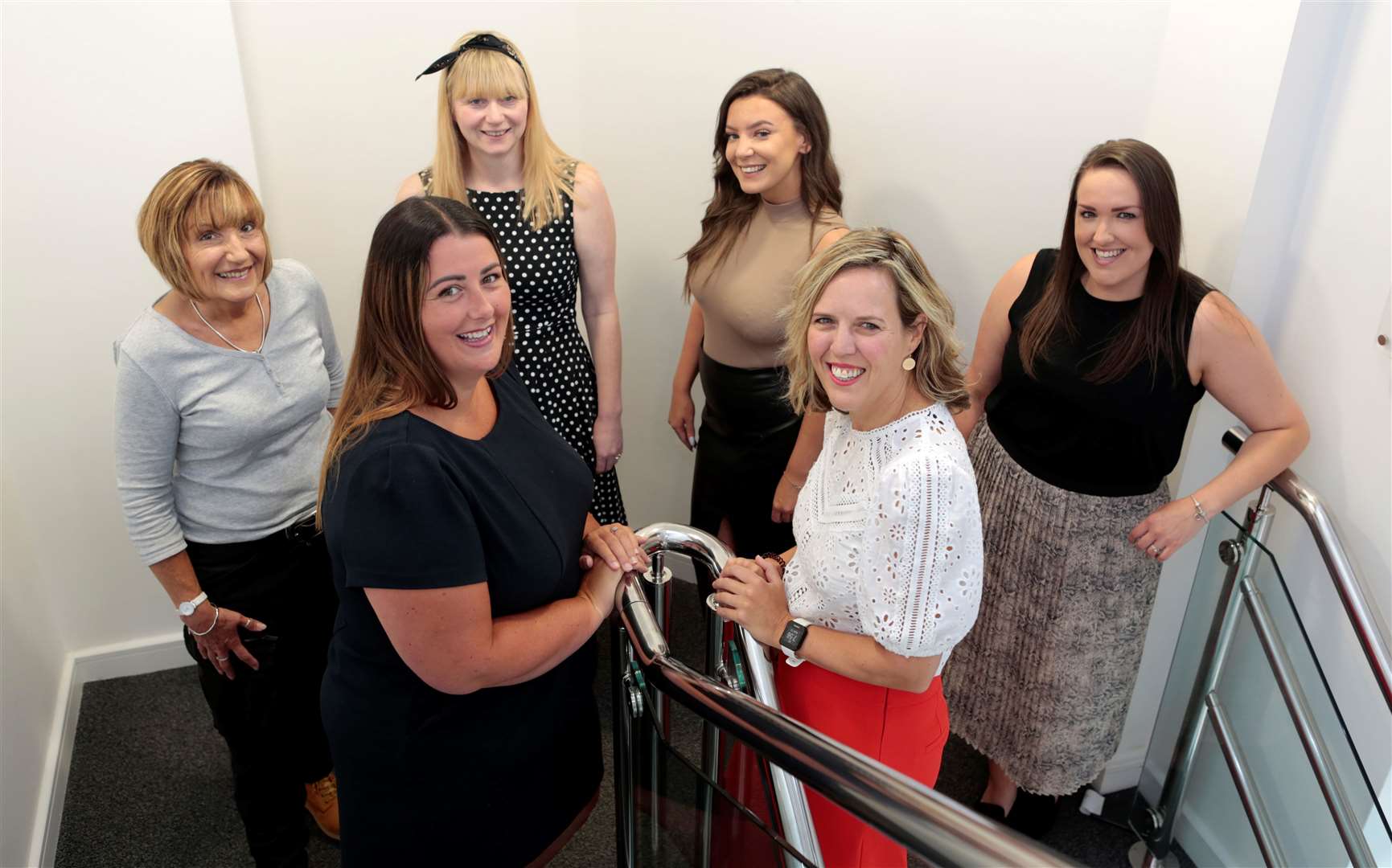 The team of women at the housing company