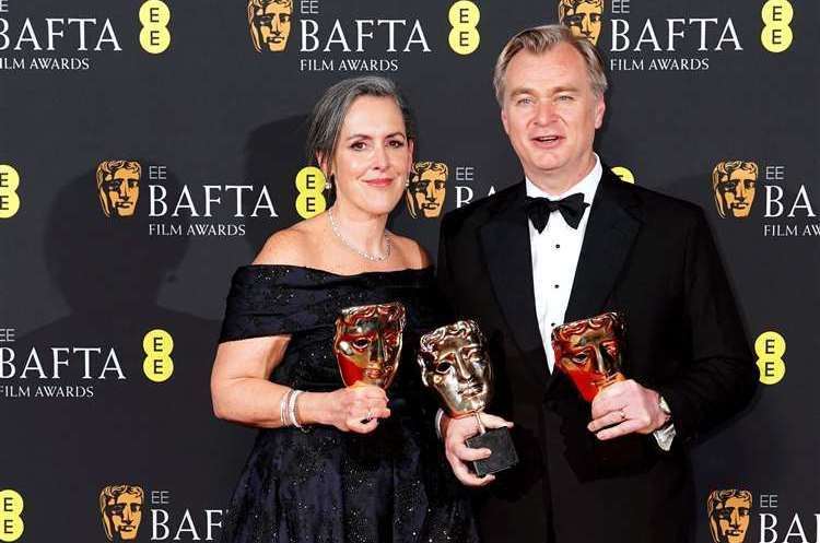 Christopher Nolan and his wife Emma Thomas have also received the title of knighthood and damehood. Picture: Ian West/PA