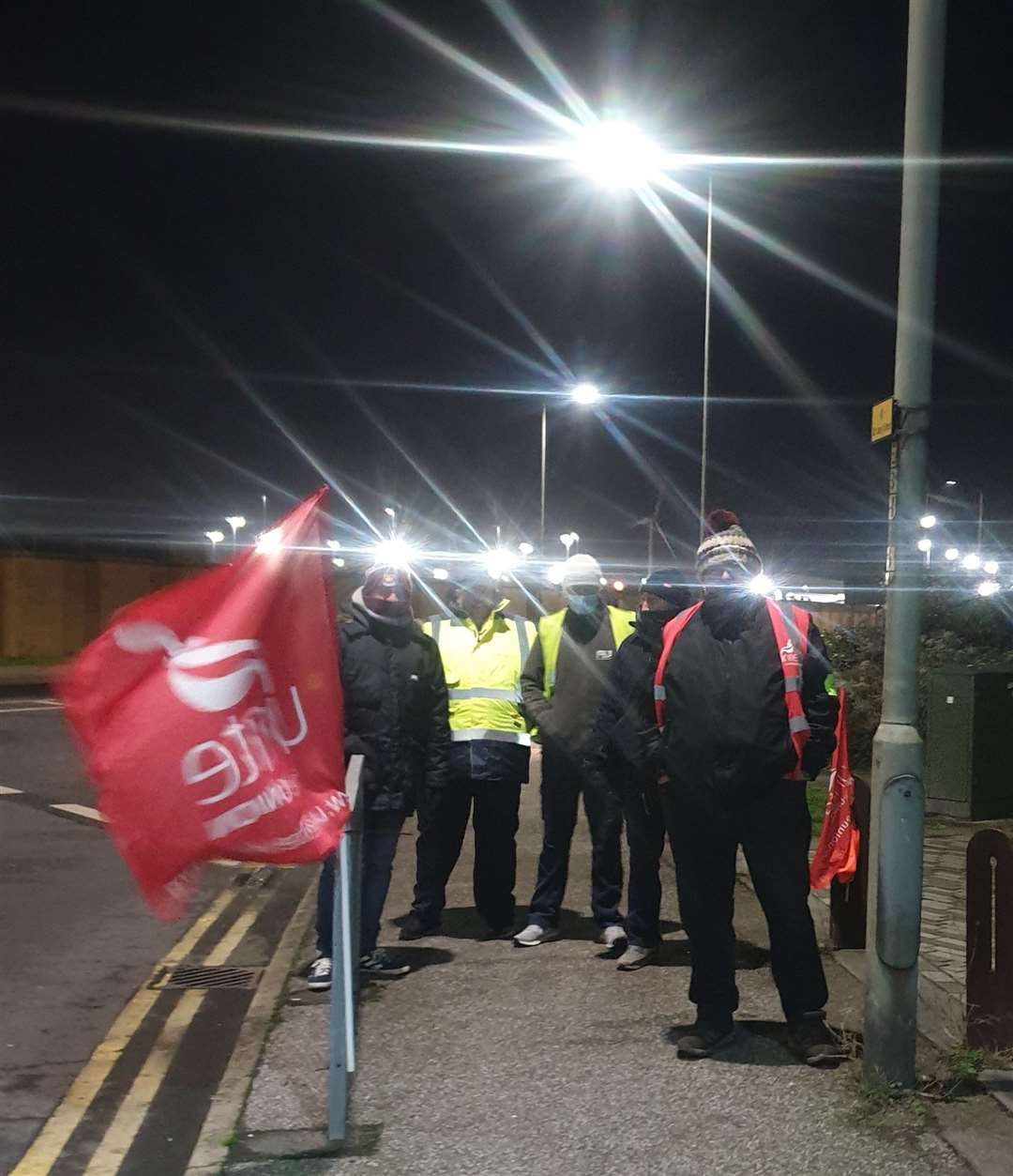 Unite strikers on picket duty before dawn outside Sheerness Docks