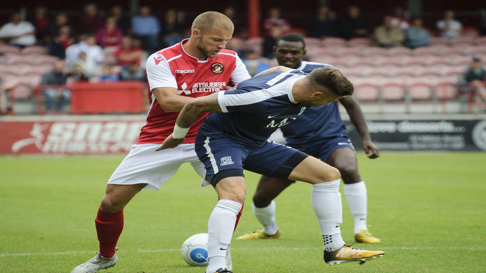Luke Coulson battles for possession with Michael Kightly Picture: Andy Payton