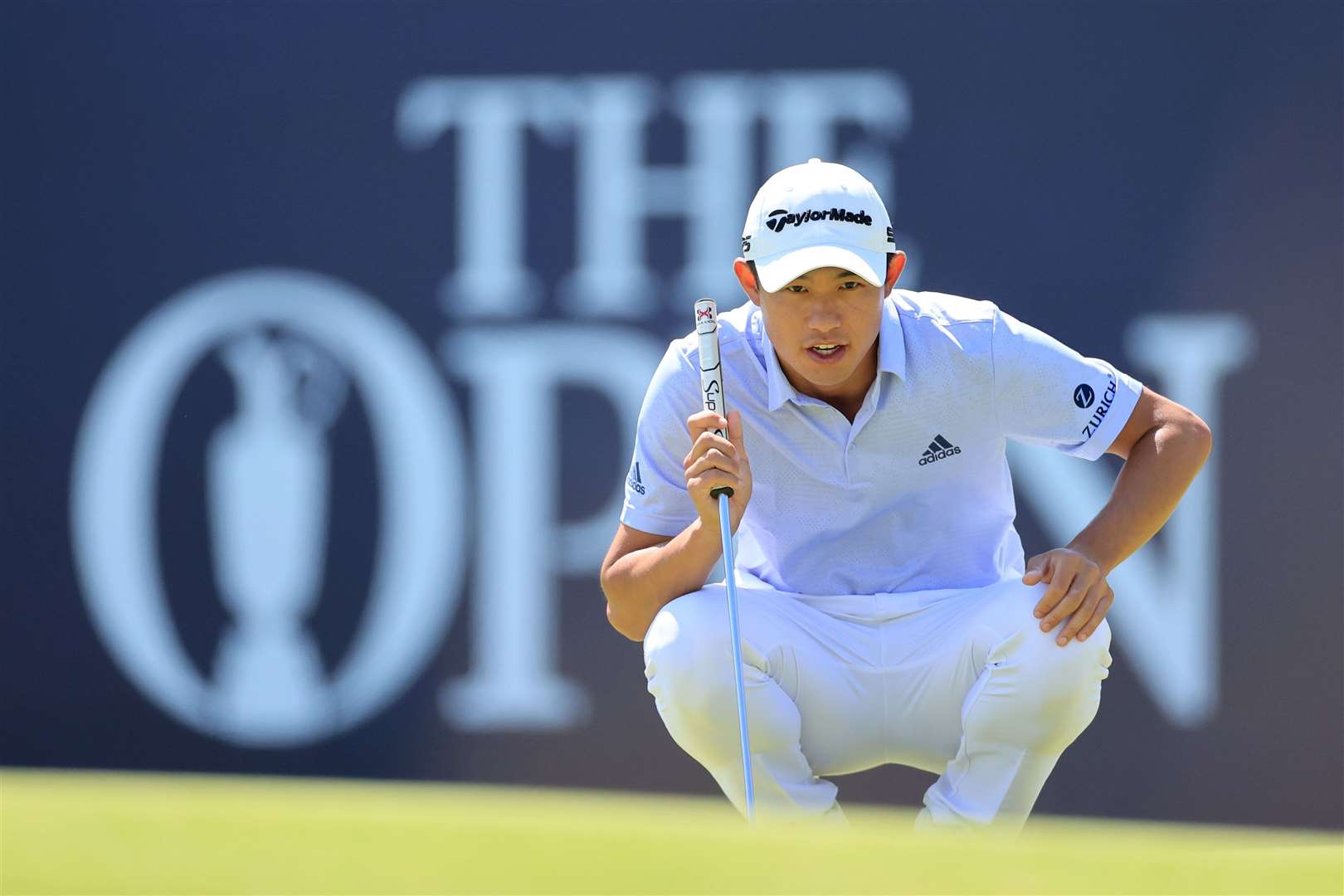 Collin Morikawa lines up a putt on the 18th during his round of 64 on Friday. Picture: The R&A