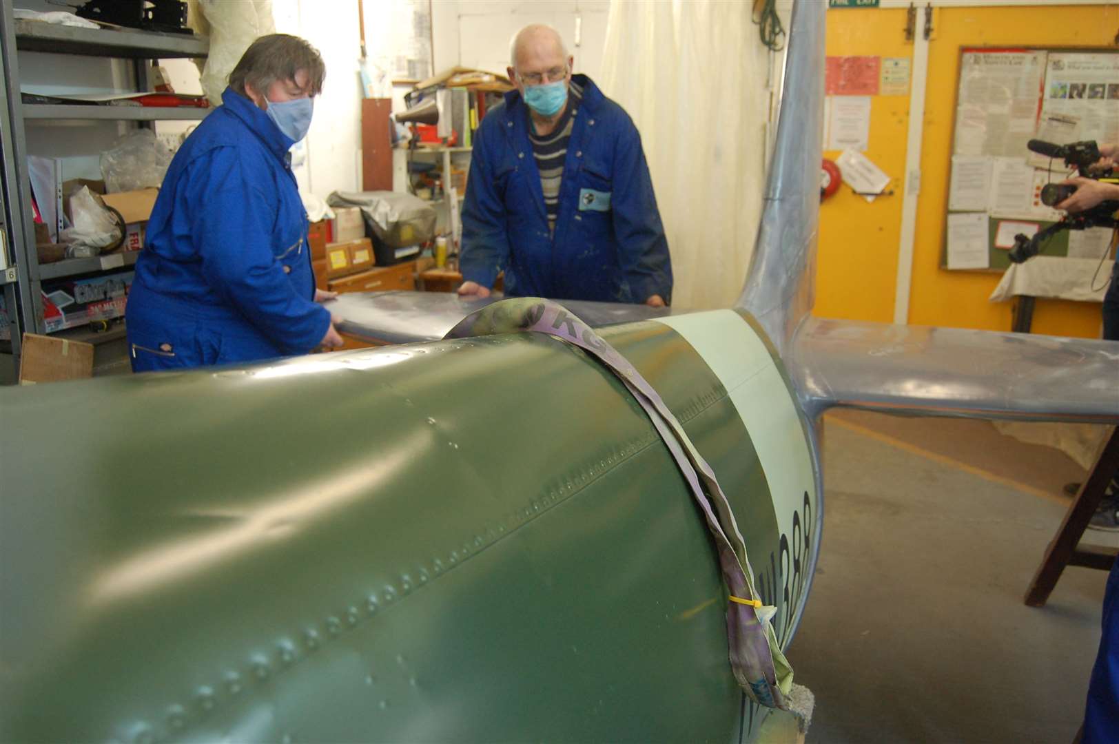 Maps' volunteers working on the Spitfire at their Rochester Airport base