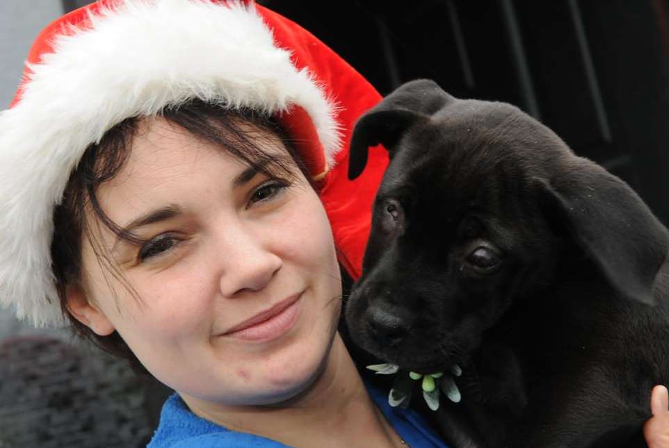 Kimberly Broderick, from Happy Endings Rescue in Faversham, with blind Belle when she was a puppy