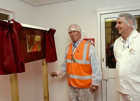 Mayor Cllr John Link unveils the plaque to open the new factory with manager Tim Gregory. Picture: Dave Downey.