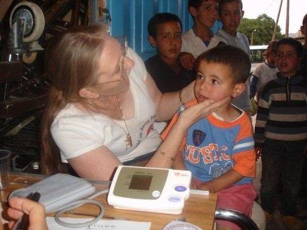Denise helped register children in Morocco and send them to medical professionals