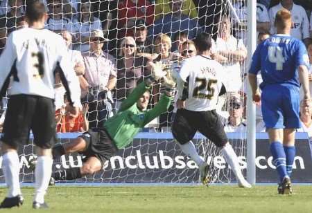 Gillingham keeper Simon Royce is unable to save Matthew Spring's spot kick during Saturday's game at Luton. Picture: MATTHEW WALKER
