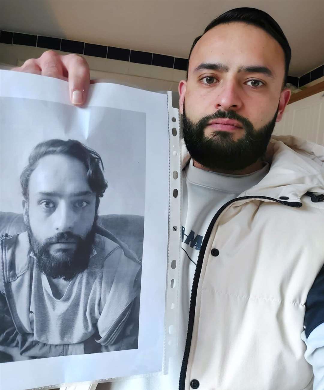 Recovering alcoholic Ranjoti now, next to a picture of him during his addiction
