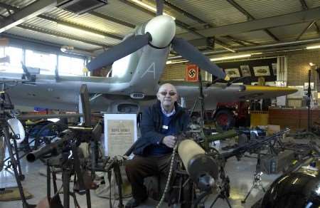Museum volunteer Terry Shakeshaft with some of the new exhibits. Picture: PHIL HOUGHTON