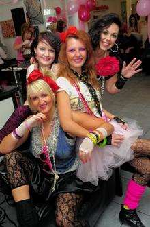 Staff at Ginger Hair Design and Ginger Body and Soul, Sheerness, dress in pink 1980s style to raise money for Breakthrough Breast Cancer