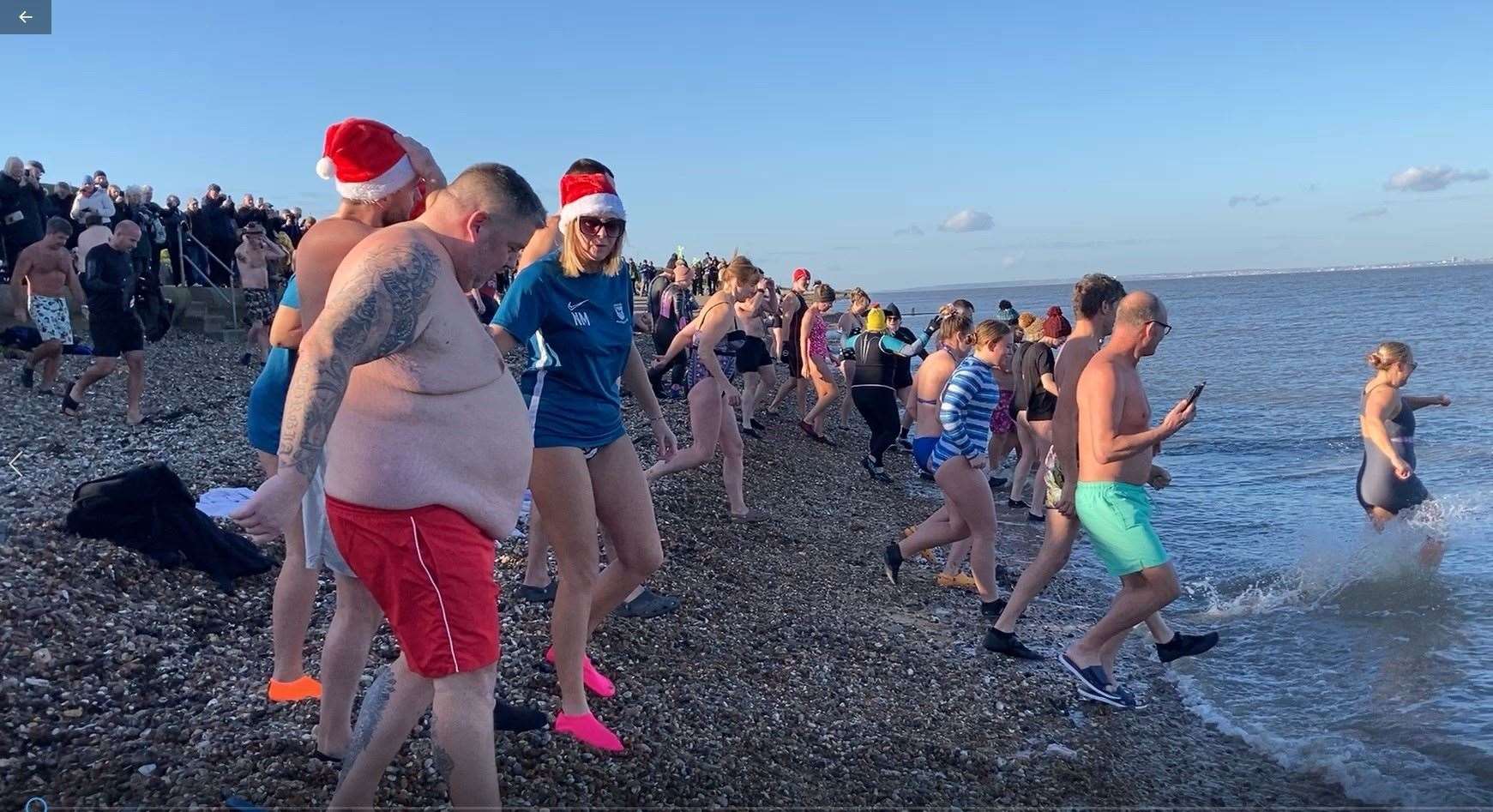 A quick dash into the sea for the Boxing Day swim on The Leas at Minster, Sheppey. Picture: John Nurden